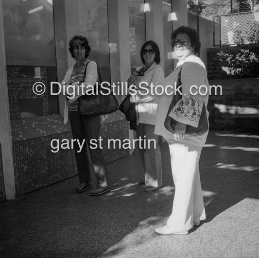 A group of ladies on the street, black and white analog groups