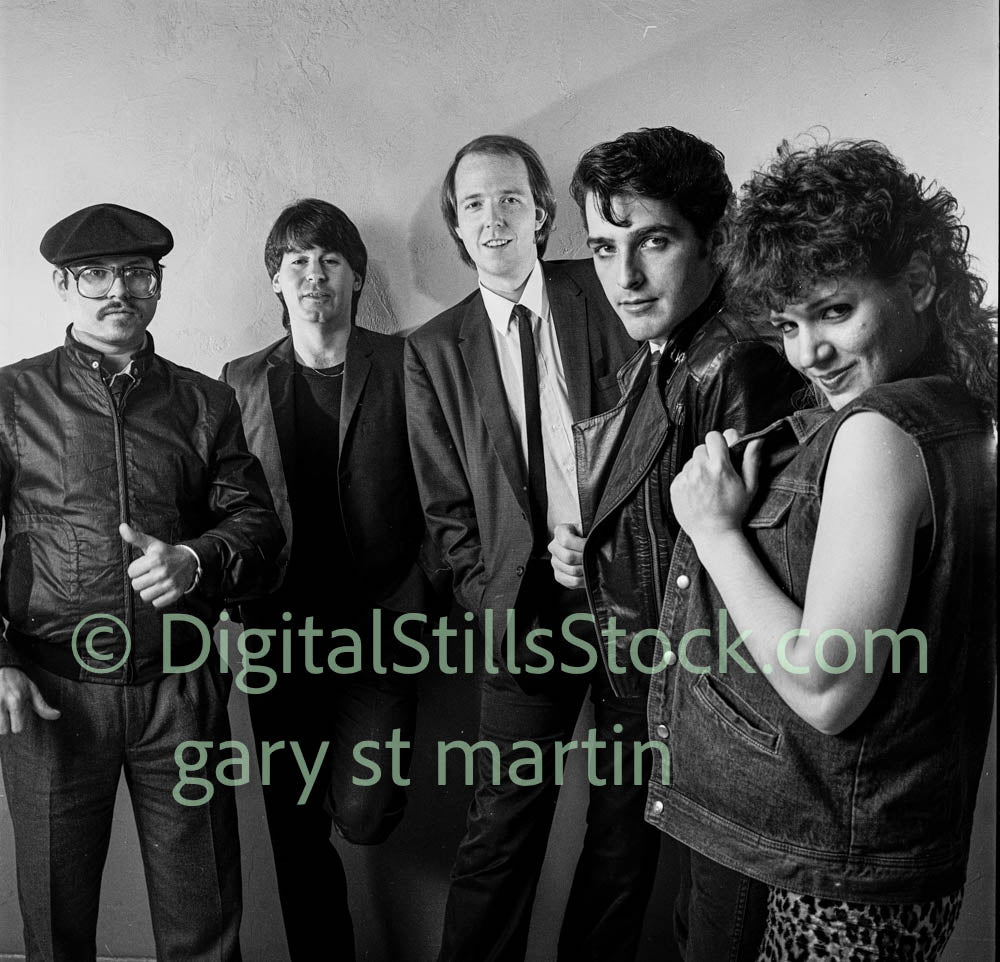 Group shot, face on, analog, black and white, clubland