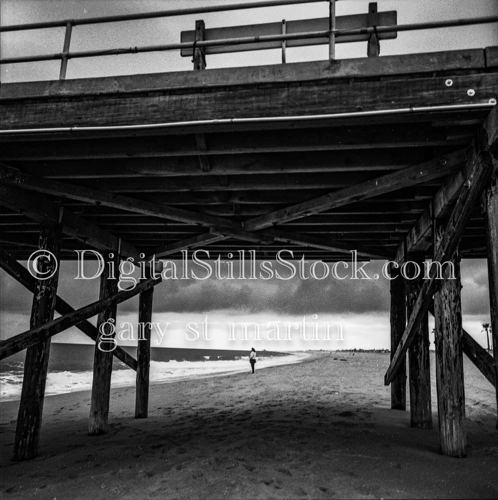 Woman Under Pier in Newport Beach
