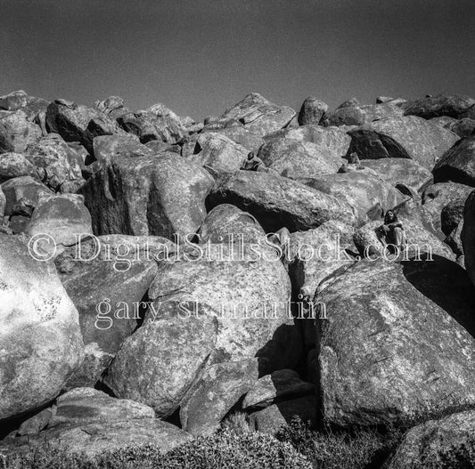 Friends Sitting on Rocks in Palm Springs, California
