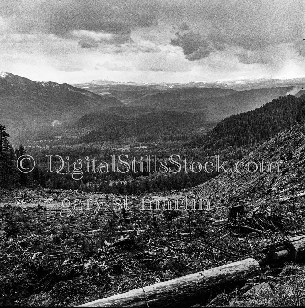 Overhead View of Cloudy Mountain Valleys