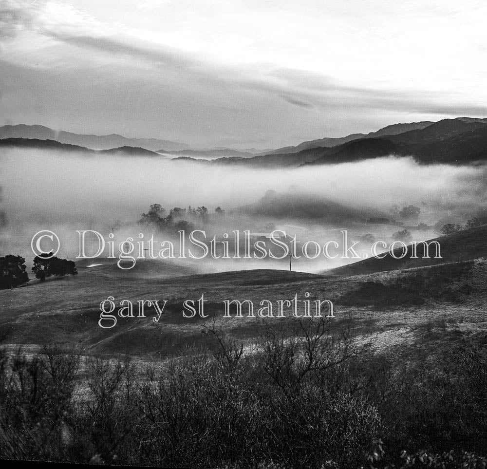 Fog Bank Over Sloped Mountains, in Northern California