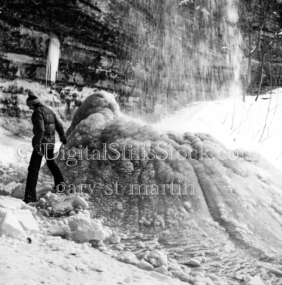 Man Posing Near Munising Falls in Winter