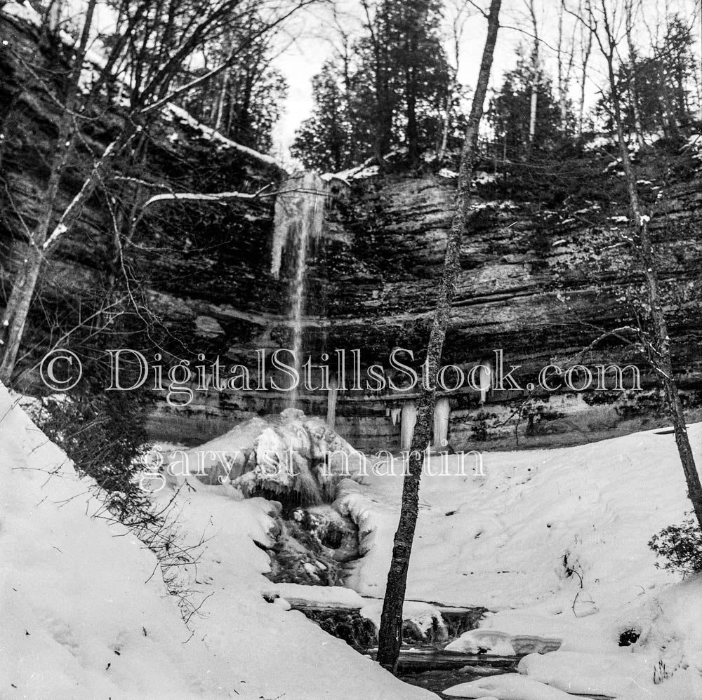 Elevated Cliff View in Snowy Munising Falls
