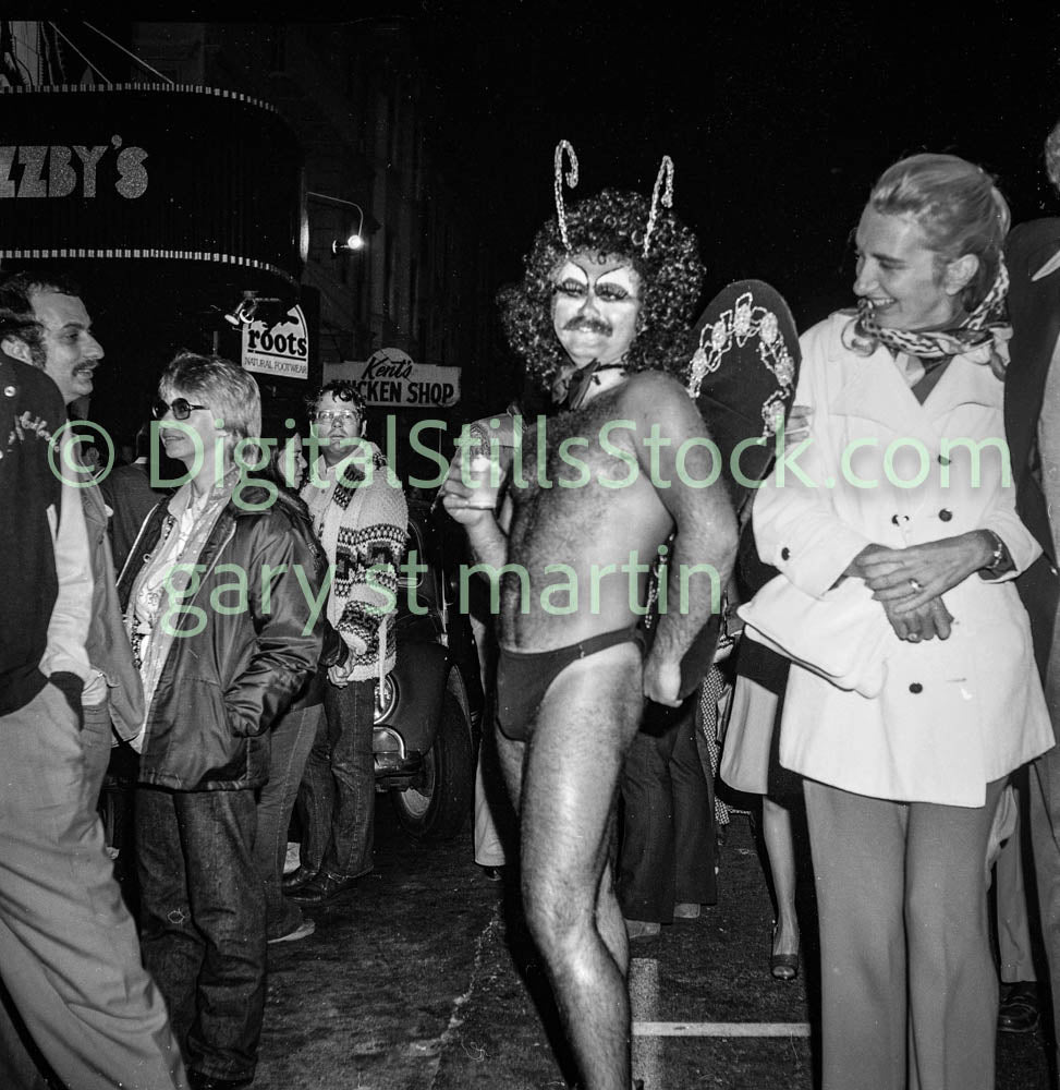 Halloween Butterfly Costume in the Crowd's Center, Analog, Polk St., Black and White