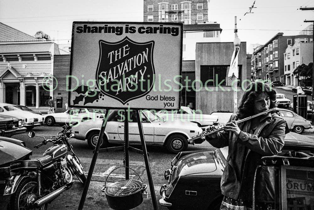 Man Playing Flute Next to Fundraiser, Analog, B & W, Polk St.