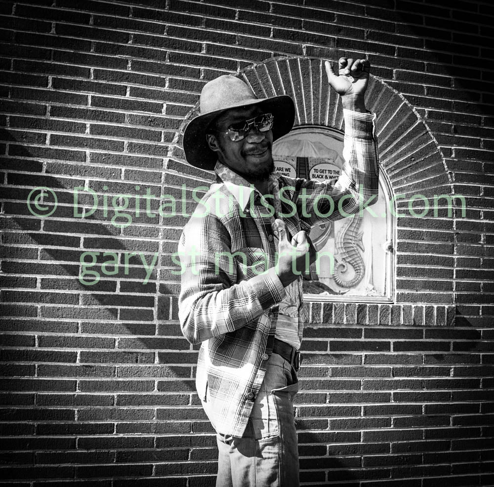 Man with Thumbs Up by Brick Wall, Analog, B & W, Polk St.