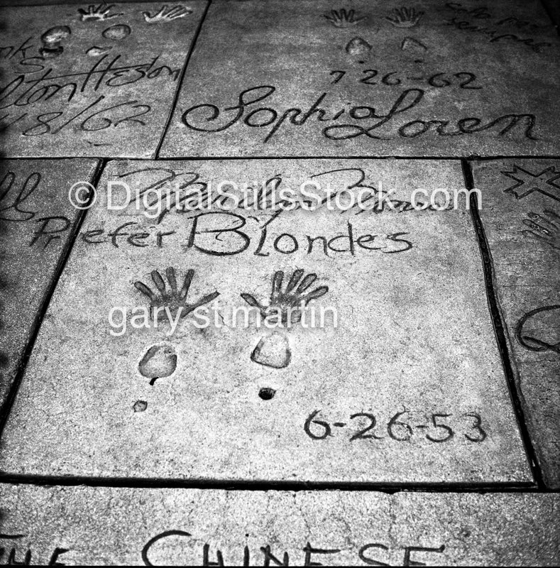 Marilyn Monroe at Grauman's Chinese Theatre hand and footprints, Analog, black and white, Oddities