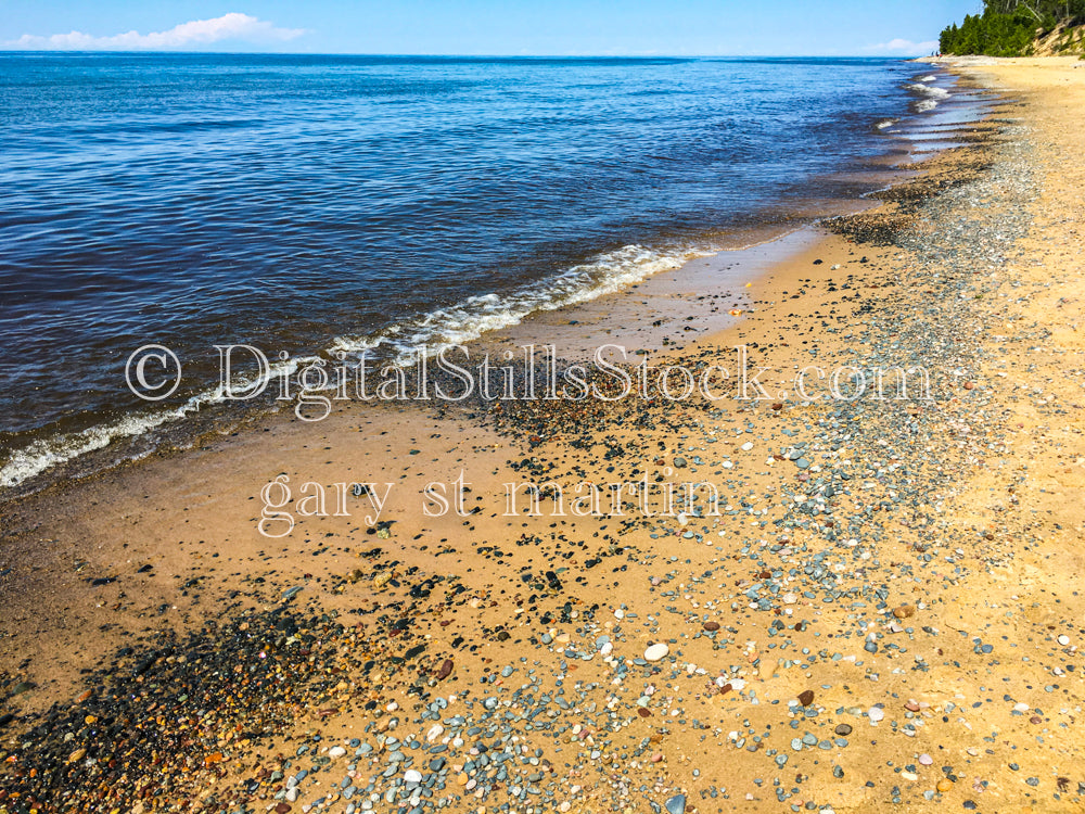 Patches of black rocks on the sand, digital Grand marais