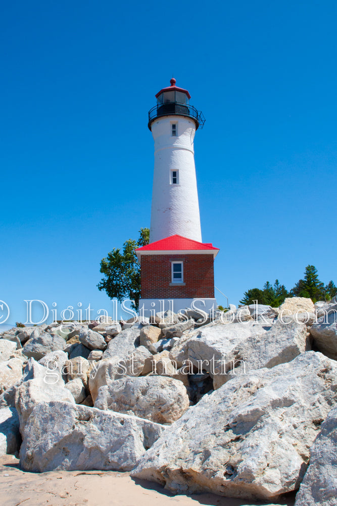 Low view of the lighthouse amongst the rocks, digital Crisp Point