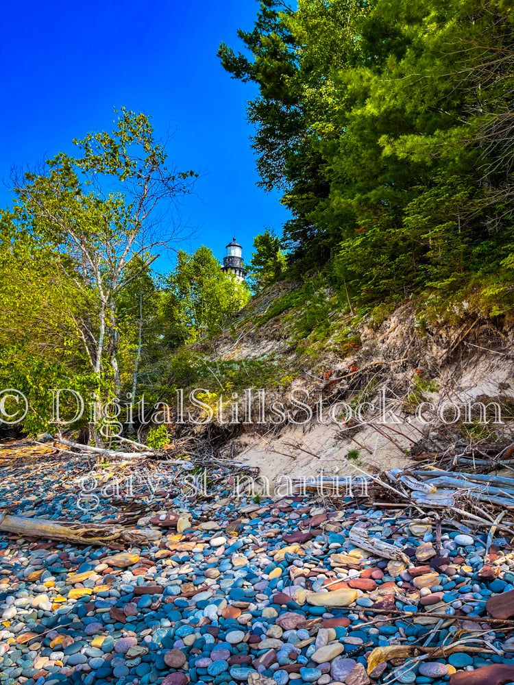 Sable Lighthouse peaking out from the treeline, digital Grand Marais