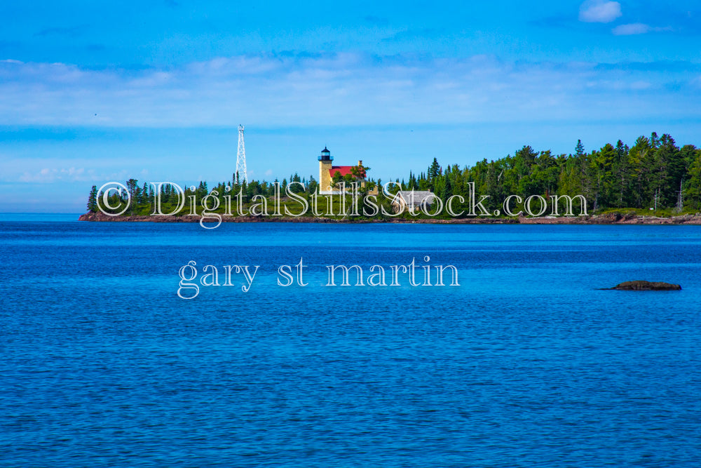 Looking at the lighthouse across the water, digital Copper Harbor