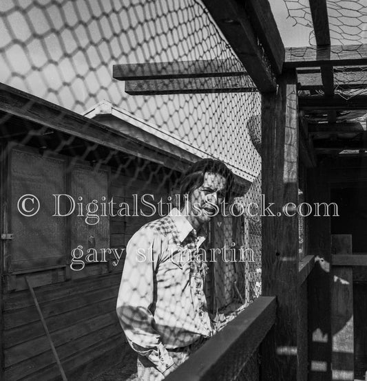 Dennis Wagner Portrait Through Fence Analog, Portrait, Men, Black & White
