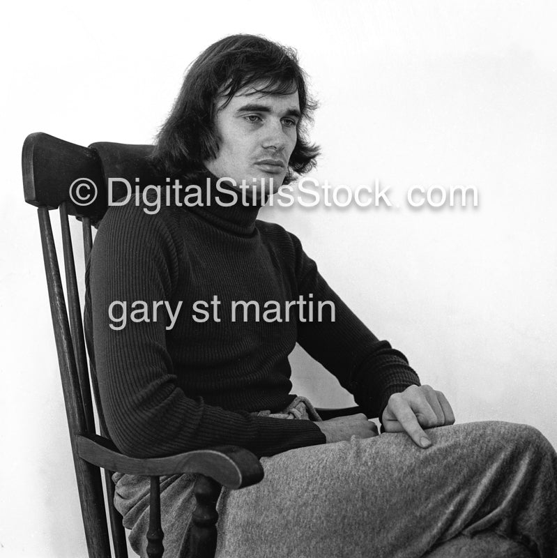 Man Sitting In A Chair Wondering 