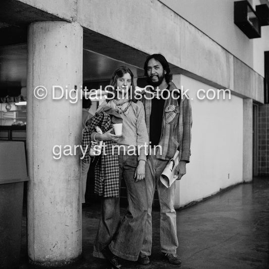 Couple posing by a Cement Post, black and white analog group