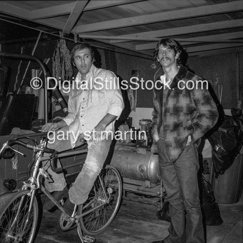 Sitting on a bike, black and white analog groups