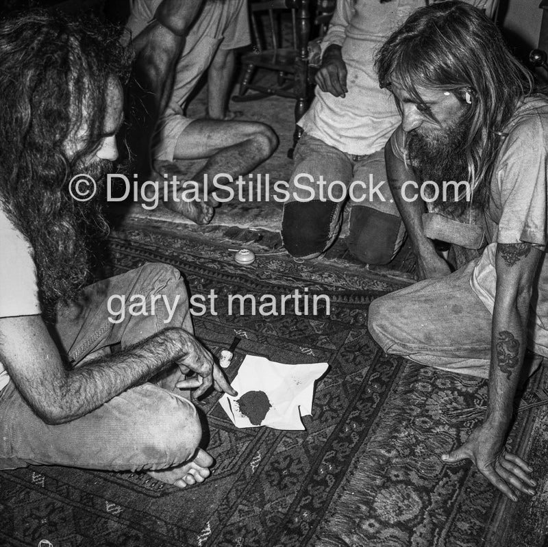 hippies looking at drugs