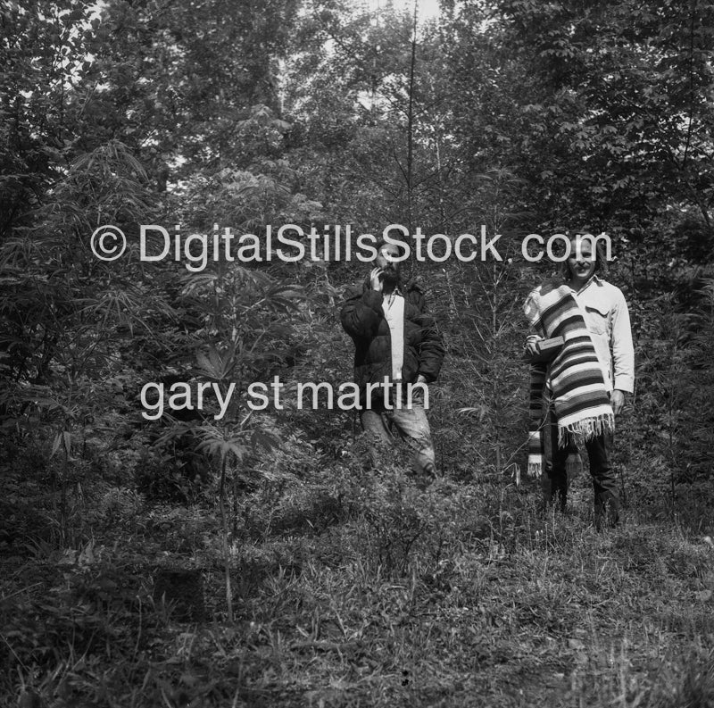 two men in a forrest