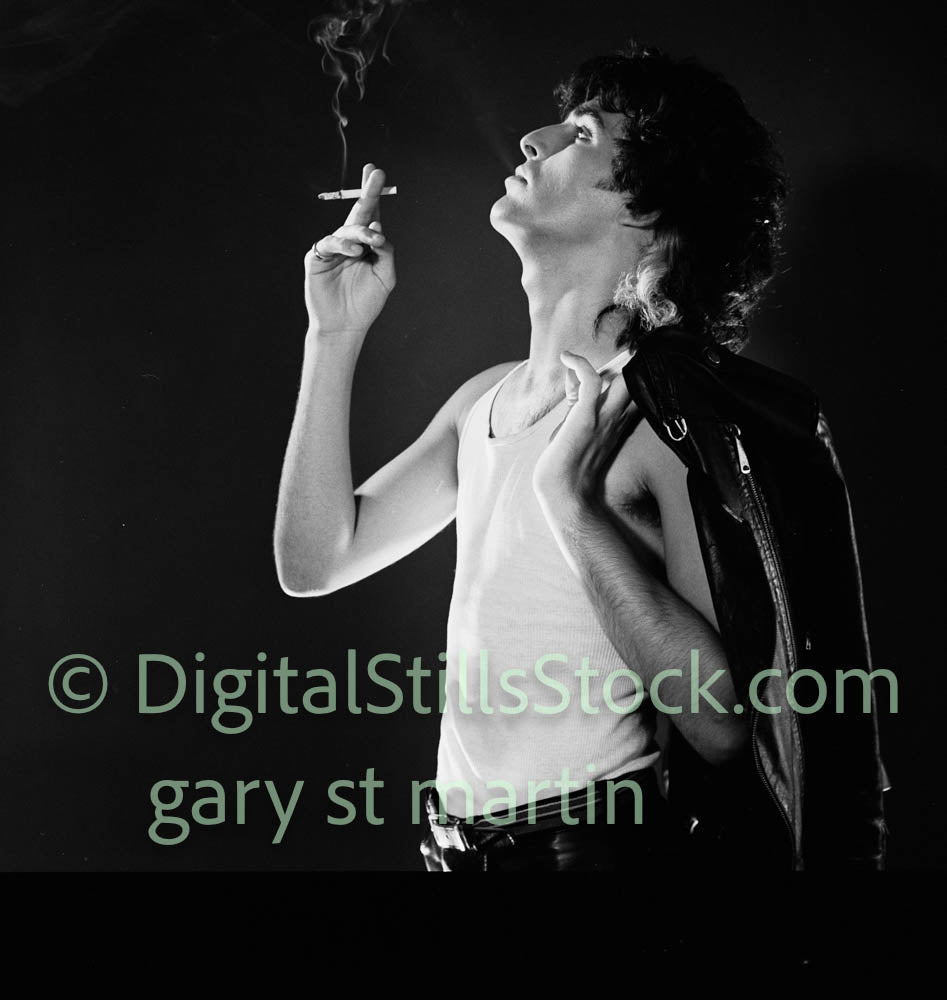 Danny looking up smoking, analog, black and white, clubland