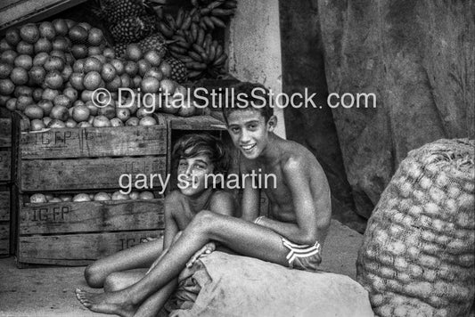 boys at a fruit stand