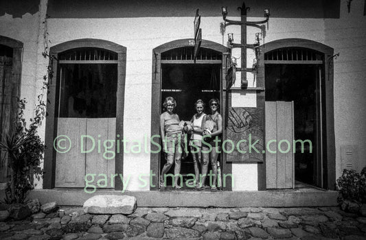 Three Women in the Doorway of a Shop