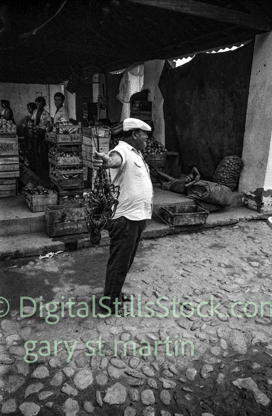 Man Holding Lobster at Banana Market Brazil