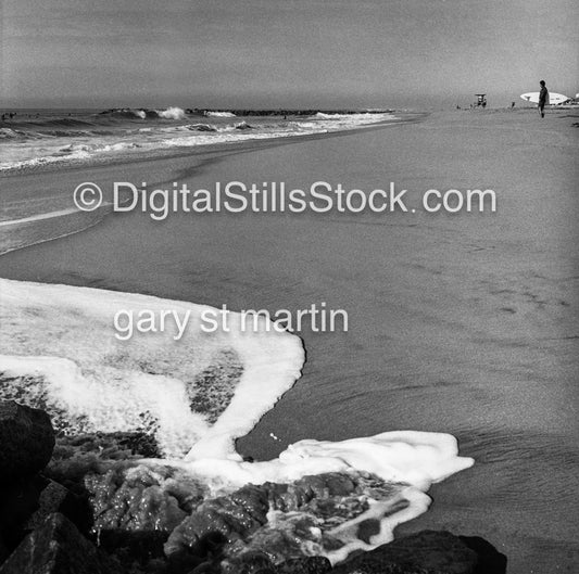 Foamy water washing up on Newport Beach, California, analog scenery