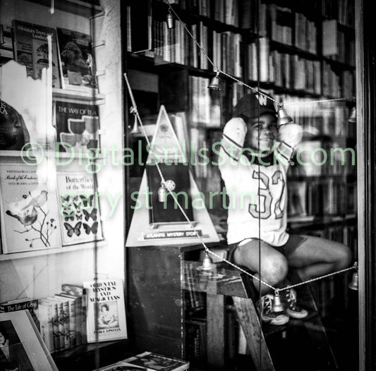Boy Smiling in Bookstore Window, Polk St., Black and White, Analog