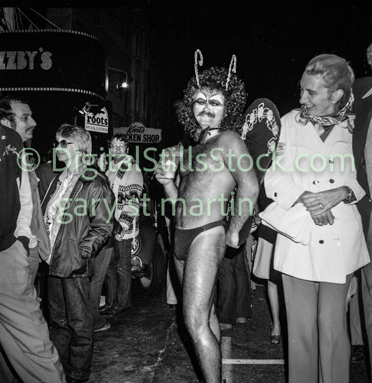 Butterfly Costume in the Crowd's Center, Analog, Polk St., Black and White