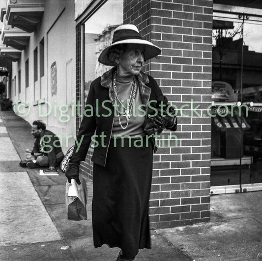 Older Woman Walking on Polk St., Polk St., B & W, Analog