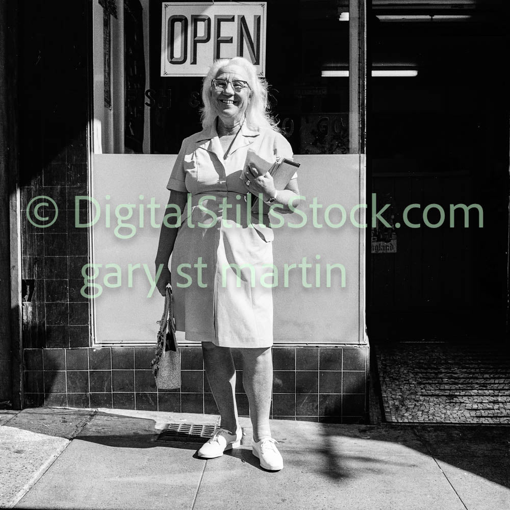 Elderly Woman Smiling with Mail, Analog, B & W, Polk St.