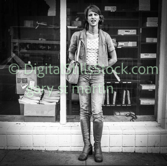 Woman with Boots in Front of Store, Plk St., Analog, B & W