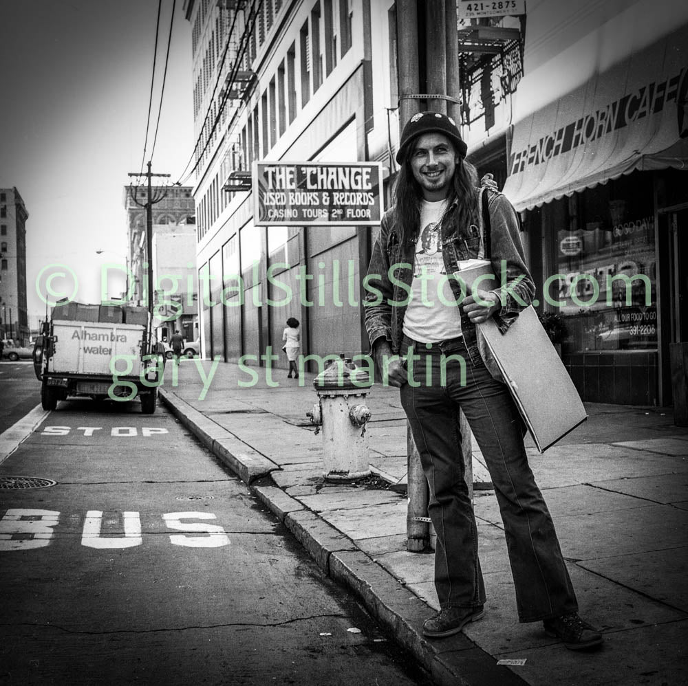 Man in Beanie Smiling by Record Store, Polk St., Analog, B & W