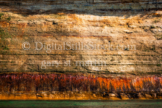 Close up with the layers of orange rock, digital Munising