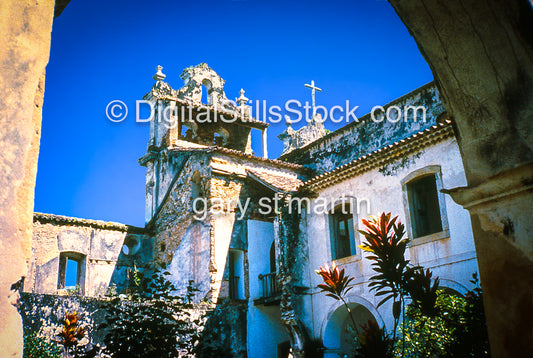 Historic building with decorative elements under a clear blue sky