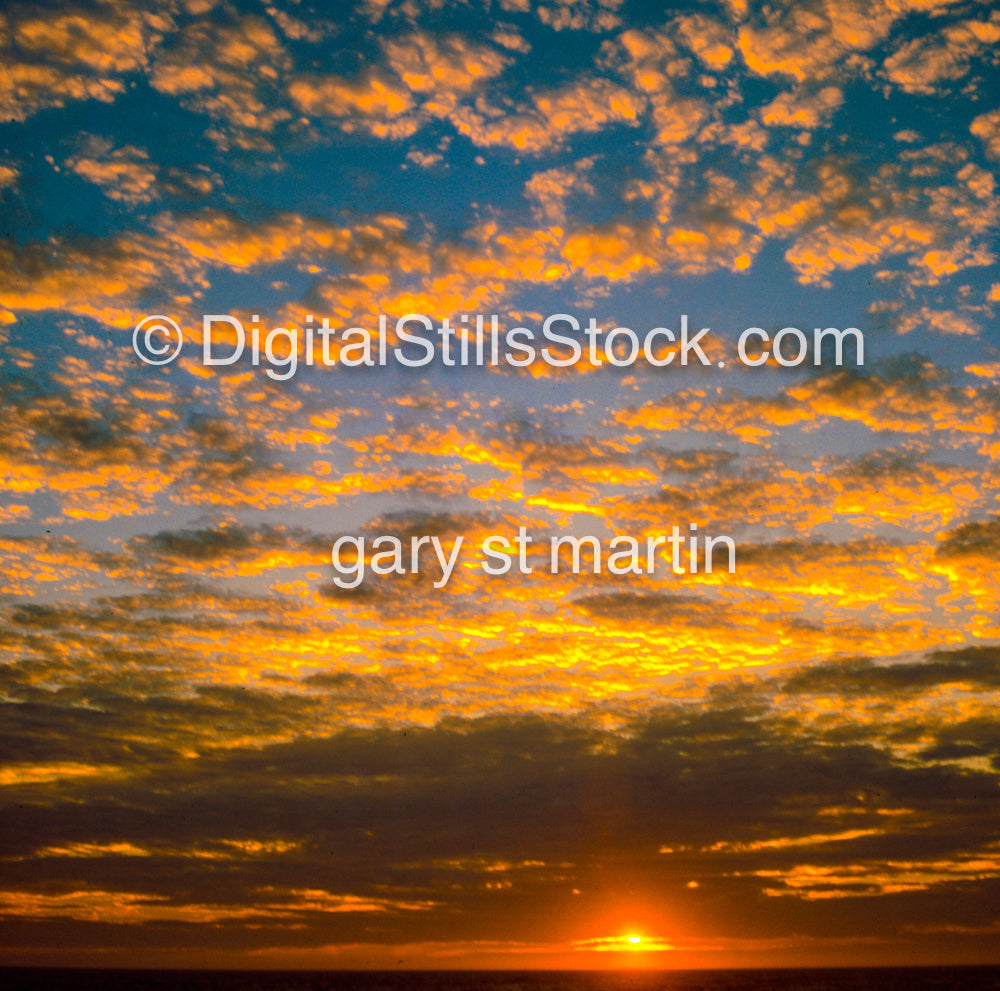 Sunset lighting up the clouds, analog sunsets