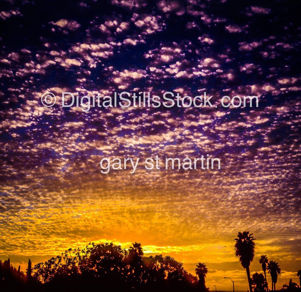 Clouds blotting the sky during a sunset, analog sunset