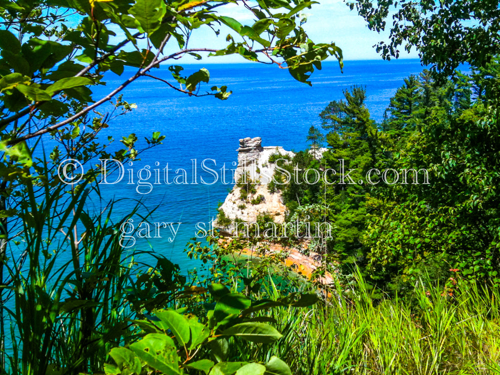 The Miner's CAstle Turret peaking through the trees, digital Munising