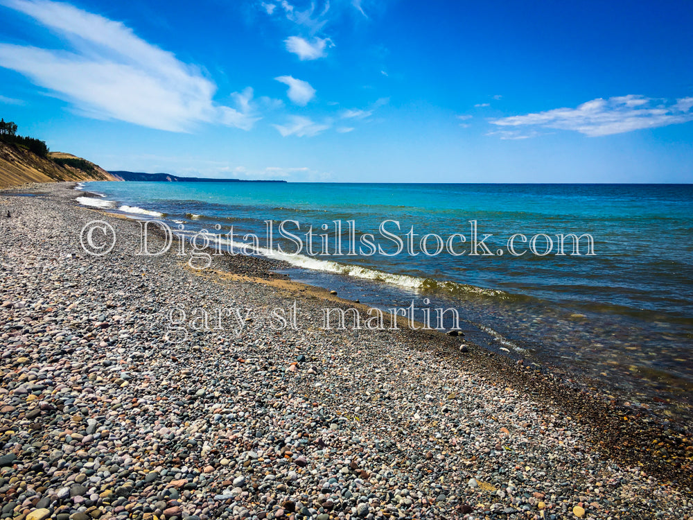 Teal water washing up on the shore