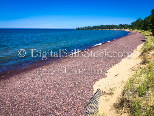 Lake shore filled with round rocks, digital copper harbor