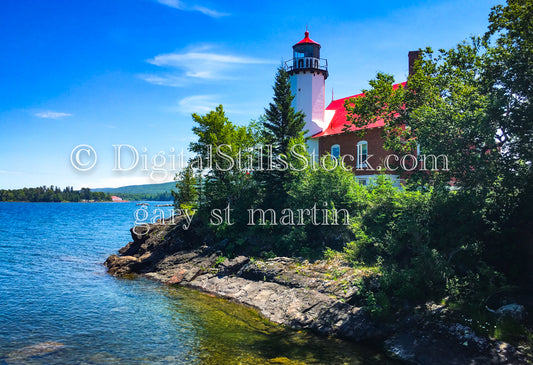 Lighthouse on the edge of the water, digital copper harbor