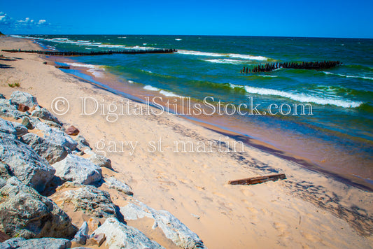 Old wooden pier posts going into the water, digital crisp point