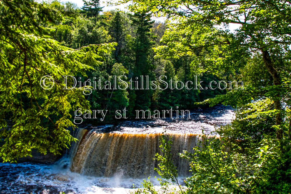 Tahquamenon falls in the middle of a forest, digital TAhqum=amenon falls