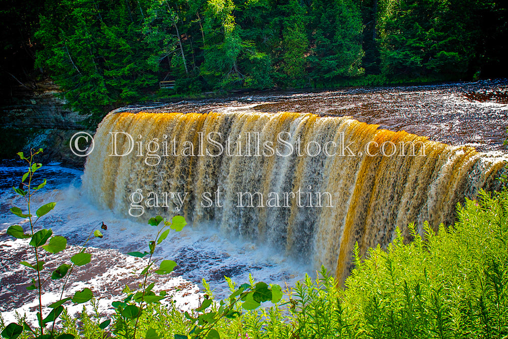 The bright mix of colors flowing from Tahquamenon falls , digital Tahquamenon falls