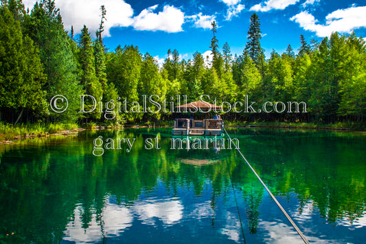 Raft floating on the calm water, Big Springs, digital big springs