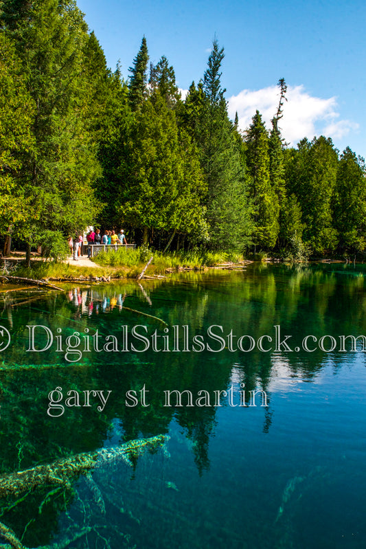 Group of people along the shore, Springs , digital Michigan