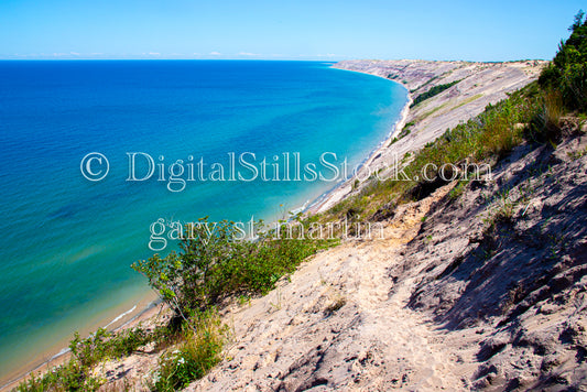 Logslide along the bright blue water, digital Grand Marais