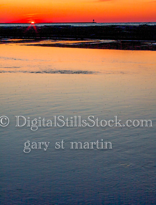 Sunset painting a red sky along the water, digital Grand Marais