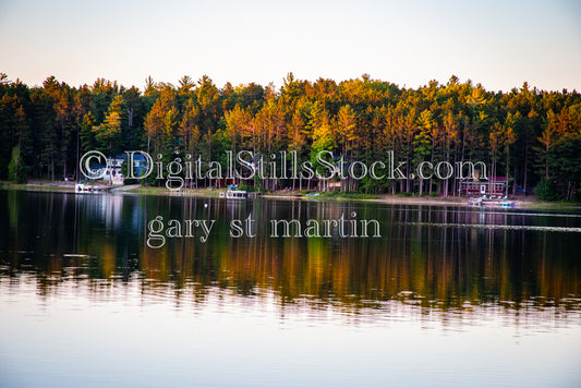 Sunset shining golden light on the trees, digital Grand Marais