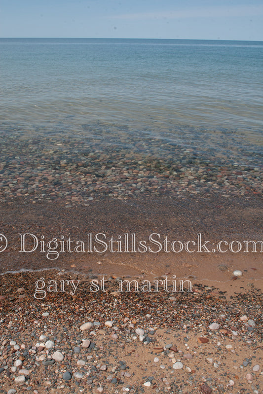 Looking out at the crystal clear water, digitL Grand Marais